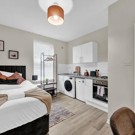 Minimalist Oasis: Airy Studio In Calming Neutrals